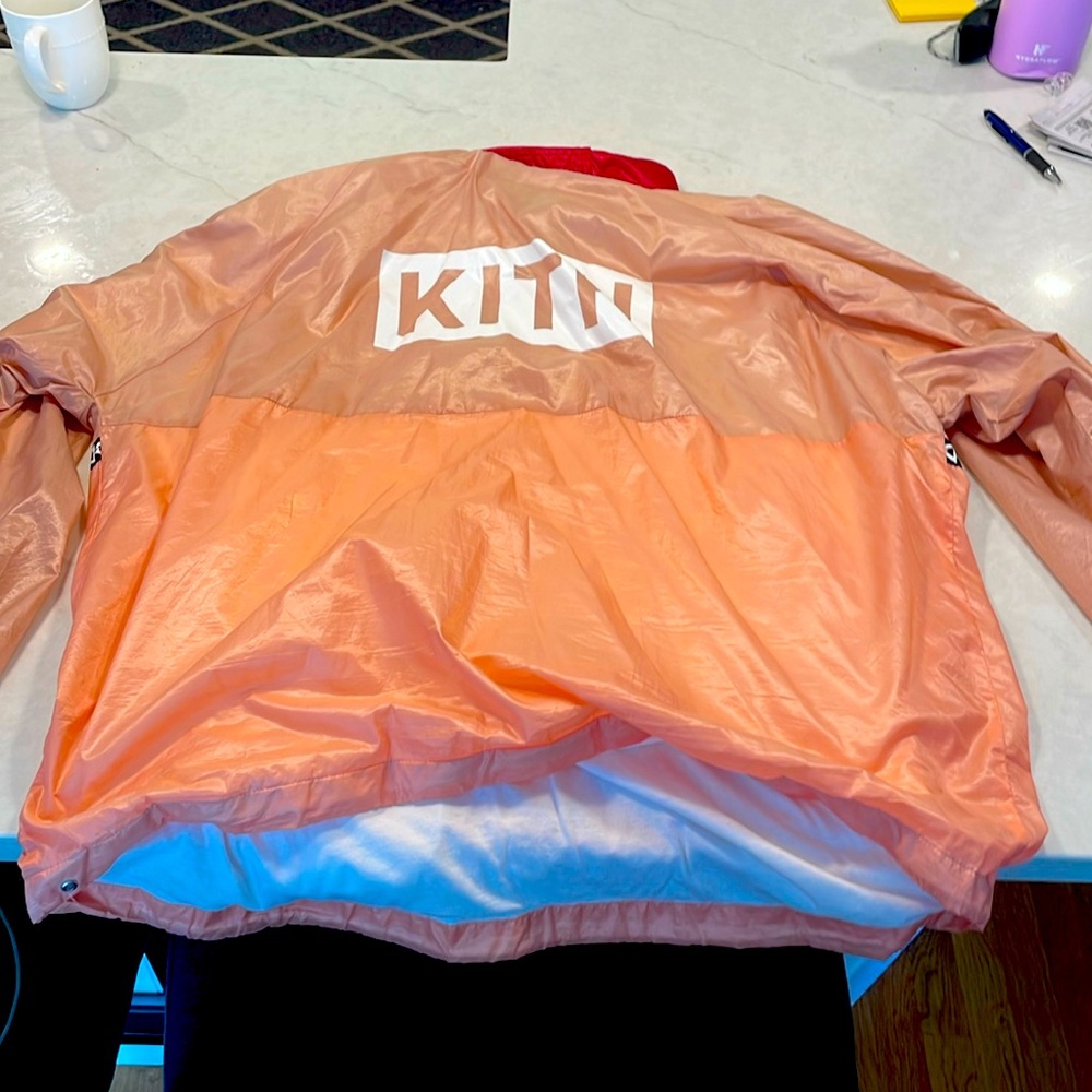 COPY - Kith windbreak/jacket, tan and peach with a red collar. Brand new